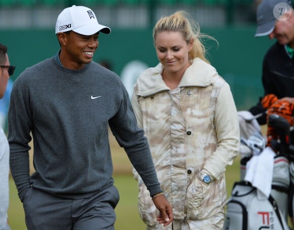 Tiger Woods et sa compagne Lindsey Vonn lors d'un entraînement précédant l'Open Championship au Muirfield Golf Club d'East Lothian, le 15 juillet 2013