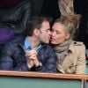 Clovis Cornillac et sa femme Lilou Fogli assistent aux Internationaux de France de tennis de Roland-Garros à Paris, le 27 mai 2014.