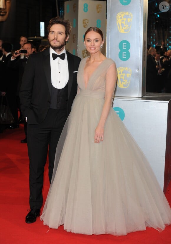 Sam Claflin et sa femme Laura Haddock - Cérémonie des British Academy Film Awards 2015 au Royal Opera House à Londres, le 8 février 2015. 