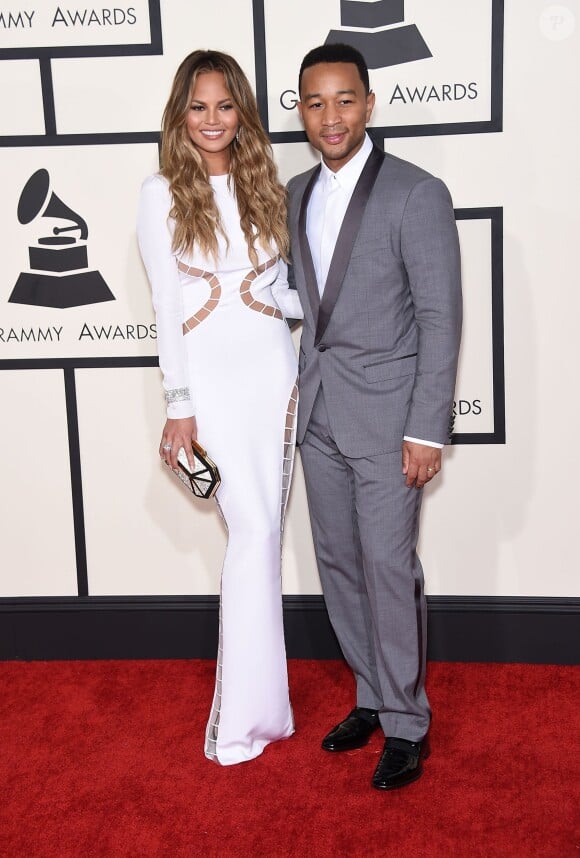 John Legend et sa femme Chrissy Teigen assistent aux 57e Grammy Awards au Staples Center. Los Angeles, le 8 février 2015.