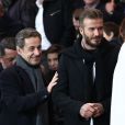  David Beckham et Nicolas Sarkozy lors du match de ligue de champions entre le PSG et Chelsea, au Parc des Princes à Paris le 17 février 2015 