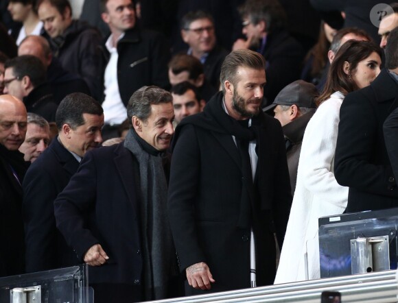 Nicolas Sarkozy, David Beckham lors du match de ligue de champions entre le PSG et Chelsea, au Parc des Princes à Paris le 17 février 2015