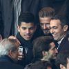 David Beckham, Youri Djorkaeff et son filslors du match de ligue de champions entre le PSG et Chelsea, au Parc des Princes à Paris le 17 février 2015