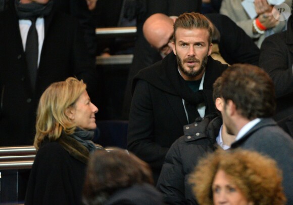 David Beckham et Claire Chazal lors du match de ligue de champions entre le PSG et Chelsea, au Parc des Princes à Paris le 17 février 2015