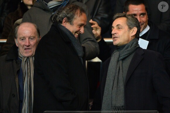 Michel Platini et Nicolas Sarkozy lors du match de ligue de champions entre le PSG et Chelsea, au Parc des Princes à Paris le 17 février 2015
