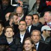 David Beckham, Sir Alex Ferguson, Youri Djorkaeff, Jamel Debbouze, Lilian Thuram et  Pierre Sarkozy lors du match de ligue de champions entre le PSG et Chelsea, au Parc des Princes à Paris le 17 février 2015