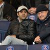 Jamel Debbouze et Marc Ladreit de la Charrière lors du match de ligue de champions entre le PSG et Chelsea, au Parc des Princes à Paris le 17 février 2015