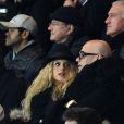  Pascal Obispo et Julie Hantson lors du match de ligue de champions entre le PSG et Chelsea, au Parc des Princes &agrave; Paris le 17 f&eacute;vrier 2015 