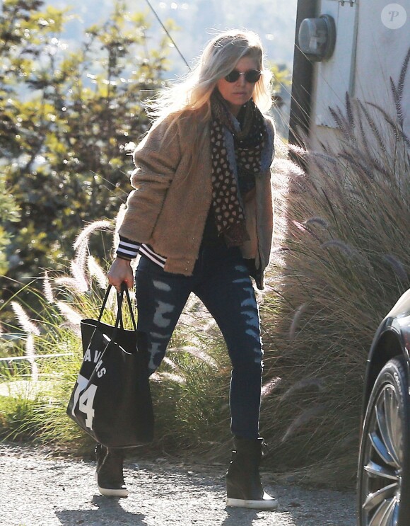 Exclusif - Fergie se rend chez une amie à West Hollywood, le 12 février 2015. 