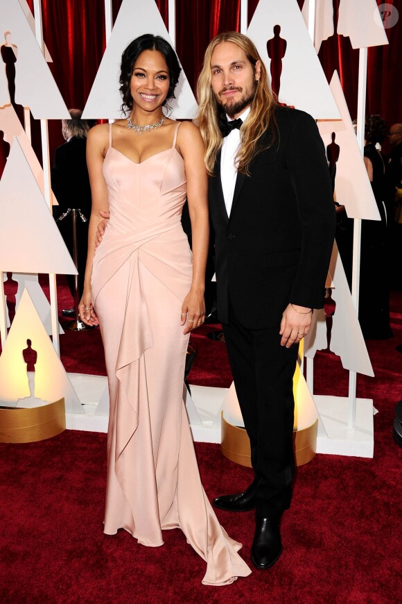 Zoe Saldana et son mari Marco Perego à la 87e cérémonie des Oscars à Hollywood, le 22 février 2015.