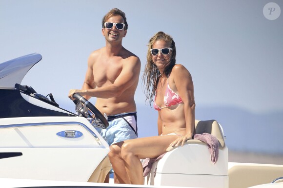 Exclusif - L'ancienne joueuse de tennis Arantxa Sanchez-Vicario et son mari Josep à Ibiza le 12 août 2013.