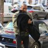 Exclusif - Kanye West et sa fille North arrivent à l'hôtel Royal Monceau. Paris, le 4 mars 2015.