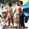 Nicole Murphy et des amis (dont David McIntosh) se détendent sur une plage de Miami, le 1er mars 2015.
