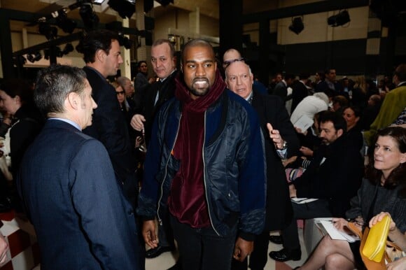 Kanye West assiste au défilé Céline automne-hiver 2015-2016, au Tennis Club de Paris, le 8 mars 2015.