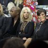 Kanye West, Kim Kardashian et Kris Jenner assistent au défilé Givenchy automne-hiver 2015-2016 au lycée Carnot. Paris, le 8 mars 2015.