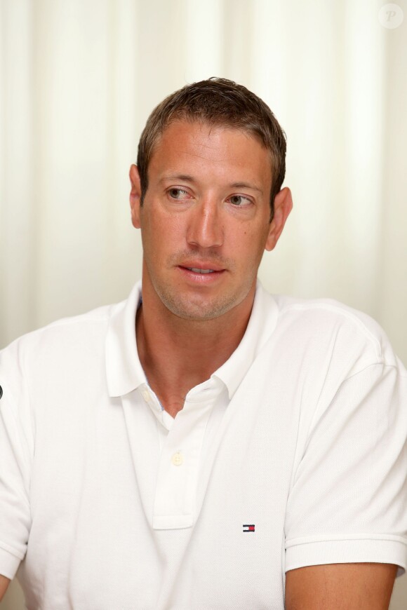 Alain Bernard lors d'une conférence de presse au Racing Club de France à Paris le 4 juillet 2013