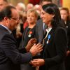François Hollande et Sophie Kamoun lors d'une cérémonie en l'honneur de personnalités sportives au palais de l'Elysée à Paris, le 9 octobre 2013