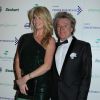 Rod Stewart et Penny Lancaster au bal Emeralds and Ivy en faveur de la recherche contre le cancer au Supernova de Londres le 3 décembre 2011
