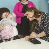 Kate Middleton, enceinte, dans un foyer pour enfants de Londres le 18 mars 2015