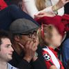Yannick Noah et son fils Joalukas lors de la rencontre entre le Paris Saint-Germain et le FC Barcelone en quart de finale de la Ligue des champions, le 15 avril 2015 au Parc des Princes à Paris
