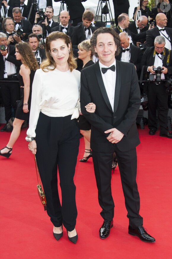 Guillaume Gallienne et Emmanuelle Devos - Montée des marches du film "La Tête Haute" pour l'ouverture du 68e Festival du film de Cannes le 13 mai 2015.