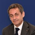 Nicolas Sarkozy, nouvellement élu à la présidence de l'UMP, visite un centre d'affaires avec Eric Ciotti et Christian Estrosi, où des start up travaillant sur les nouvelles technologies sont installées, à Nice, le 22 avril 2015.