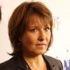 Carole Rousseau - Courtier d'un jour pour encourager les clients à passer ce jour là le maximum d'ordres dans la salle des marchés d'Aurel BGC Rue Vivienne à Paris. Le 11 septembre 2014.
