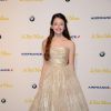 Mackenzie Foy (robe Oscar de la Renta) lors de la soirée "Le Petit Prince" sur le port de Cannes, le 22 mai 2015.