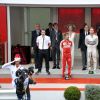Le prince Albert II de Monaco, son épouse la princesse Charlene et ses deux neveux Pierre et Andrea Casiraghi lors de la cérémonie du podium du 73e Grand Prix de Monaco le 24 mai 2015, remporté par Nico Rosberg devant Sebastian Vettel et Lewis Hamilton