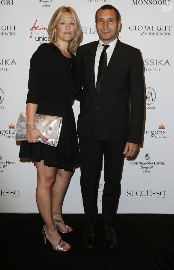 Zinedine Soualem et sa compagne Caroline Faindt - Photocall au dîner du Global Gift Gala, organisé au Four Seasons Hôtel George V à Paris, le 25 mai 2015.