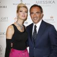 Nikos Aliagas et sa compagne Tina Grigoriou - Photocall au dîner du Global Gift Gala, organisé au Four Seasons Hôtel George V à Paris, le 25 mai 2015.