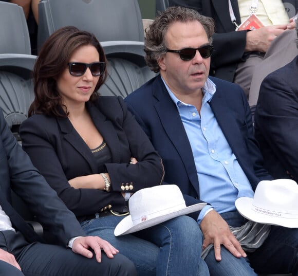 Luc Chatel et Mahnaz Hatami au second jour des Internationaux de Roland-Garros à Paris, le 25 mai 2015