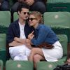 Adrien Gallo et sa compagne Ella au second jour des Internationaux de Roland-Garros à Paris, le 25 mai 2015
