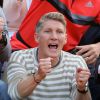Le footballeur Bastian Schweinsteiger encourage sa compagne, la tenniswoman serbe Ana Ivanovic, qui a remporté son match en 3 sets face à Misaki Doi à Roland-Garros à Paris le 27 mai 2015.