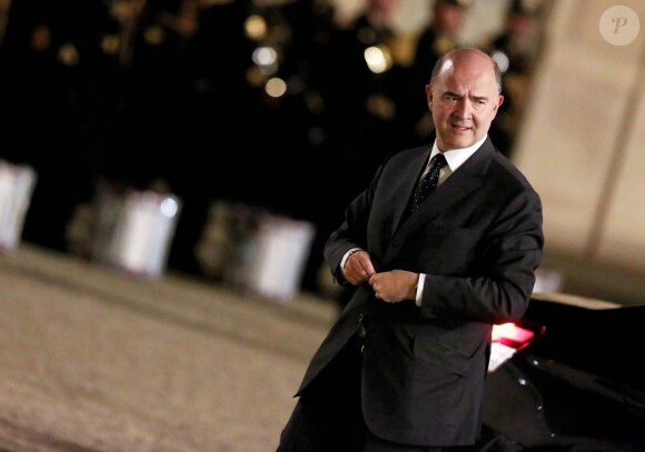 Pierre Moscovici arrivant au dîner d'état au palais de l'Elysée à Paris, le 26 mars 2014