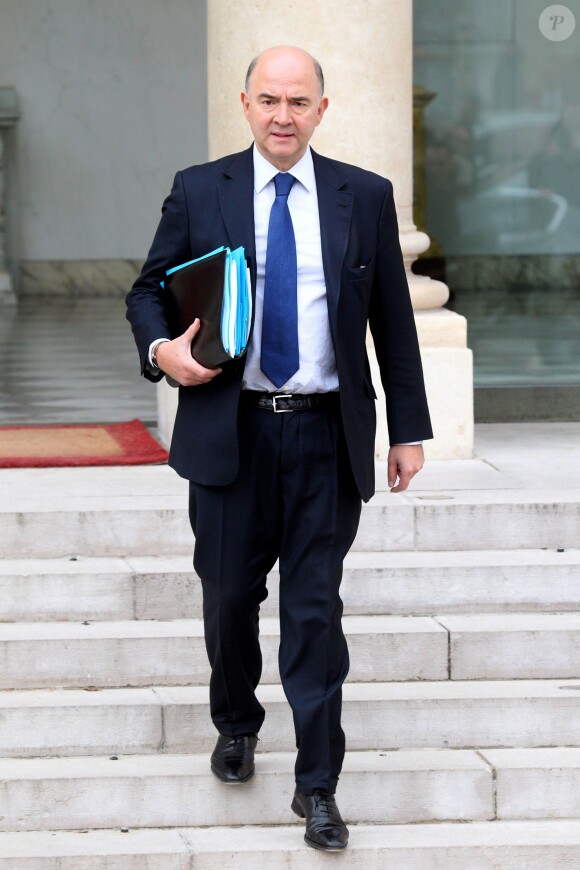 Pierre Moscovici - Sortie du conseil des ministres au Palais de l'Elysée, à Paris, le 22 janvier 2014