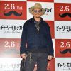 Johnny Depp pose lors du photocall du film "Charlie Mortdecai" à Tokyo, le 28 janvier 2015.