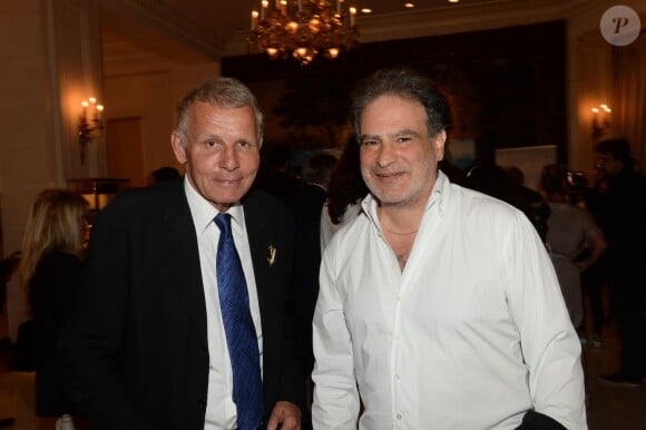 Patrick Poivre d'Arvor et Raphaël Mezrahi - Gala de charité annuel de la Fondation Maud Fontenoy à l'hôtel Bristol à Paris, le 4 juin 2015.
