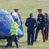 Le prince Harry arrive à Kensington Palace en hélicoptère le 11 juin 2015 après une cérémonie au mémorial de Staffordshire.
