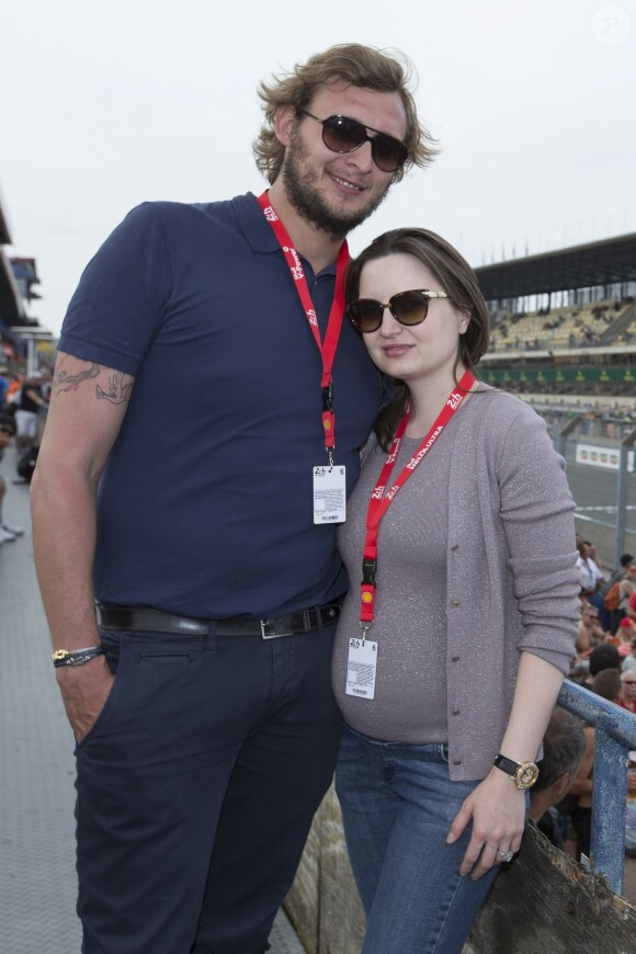 Exclusif - Amaury Leveaux et sa compagne Elizaveta (enceinte) lors de la 83e édition des 24 Heures du Mans, le 13 juin 2015. 