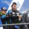 Patrick Dempsey, en extase après avoir terminé à la seconde place des 24 Heures du Mans en catégorie GT Am, le 14 juin 2015 au Mans, sur le Circuit des 24 Heures