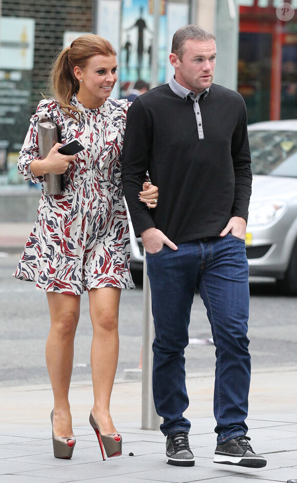 Wayne et Coleen Rooney dans les rues de Manchester, le 20 août 2013