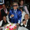 Exclusif - Rosa Bouglione (104 ans) avec son fils Emilien et Michou - L'homme en bleu fête son 84e anniversaire dans son cabaret Chez Michou à Paris le 18 juin 2015.
