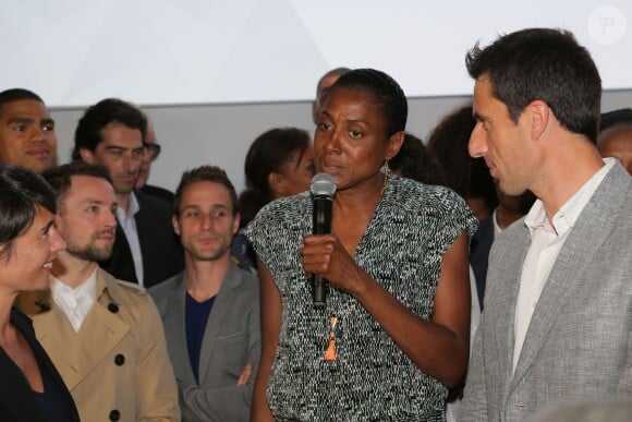 Marie-José Pérec et Tony Estanguet lors de la cérémonie de coup d'envoi de la candidature de la France pour accueillir les Jeux olympiques de 2024 à la Maison du Sport Français à Paris le 23 juin 2015
