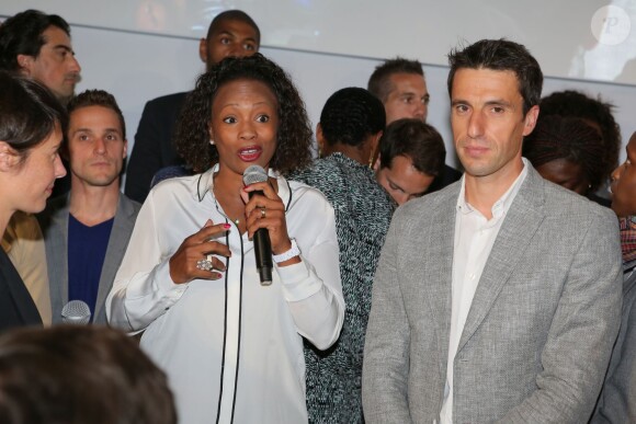 Laura Flessel et Tony Estanguet lors de la cérémonie de coup d'envoi de la candidature de la France pour accueillir les Jeux olympiques de 2024 à la Maison du Sport Français à Paris le 23 juin 2015