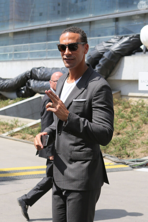 L'ex-footballeur Rio Ferdinand lors du défilé Louis Vuitton (collection homme printemps-été 2016) au Parc Andre-Citroën. Paris, le 25 juin 2015.