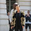 Kris Jenner et son comapagnon au défilé de mode masculine Balmain printemps-été 2016 à l'hôtel Potocki à Paris le 27 juin 2015.