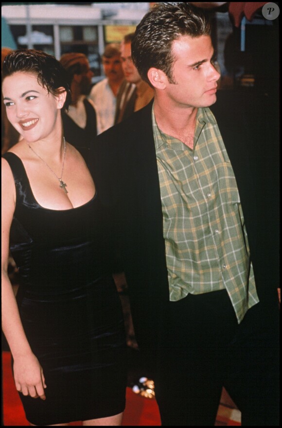 Drew Barrymore et Jamie Walters en 1990
