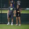 Andy Murray et Amélie Mauresmo à l'entraînement au All England Lawn Tennis and Croquet Club de Wimbledon à Londres, le 28 juin 2015
