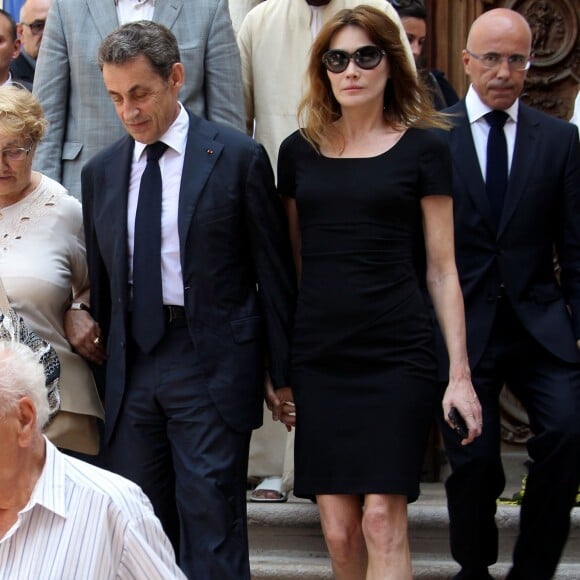 Nicolas Sarkozy et son épouse Carla Bruni-Sarkozy lors des obsèques de Charles Pasqua en la cathédrale Notre-Dame du Puy à Grasse, le 7 juillet 2015